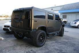 Hummer H2 Matte Black Truck Wrap Miami Florida Httpcarwrapsolutionscommatte-black-wrap-carbon-fiber-racing-stripehtml Hummer Truck Hummer H2 Hummer