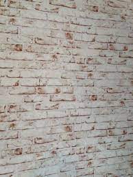 A distressed red brick wall in the dining zone and metal chairs mix up with refined and contemporary furniture for a unique look. As Creation Distressed Brick Effect Red White Wallpaper 9078 13 Brick Effect Wallpaper Red And White Wallpaper Brick Wallpaper