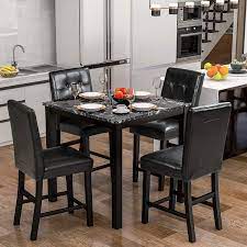 Marrying modern and glamorous elements, this two tier coffee table sets a sleek and chic foundation in your living room layout. Amazon Com Lz Leisure Zone Dining Table Set For 4 Kitchen Table Set Faux Marble Veneer Wooden Top Counter Height Dining Room Table Set With 4 Leather Upholstered Chairs Black Table