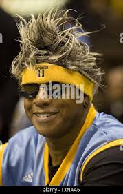 Denver Nuggets television announcer Chris Marlowe before calling the  Nuggets game against the Los Angeles Lakers in the first half of an  basketball game Sunday, April 10, 2022, in Denver. (AP Photo/David