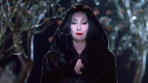 Becoming Morticia For The Addams Family Was An 'Exhausting' Process For  Anjelica Houston