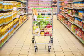 Trolley Full Of Products In Supermarket Stock Photo, Picture And Royalty Free Image. Image 64273343.