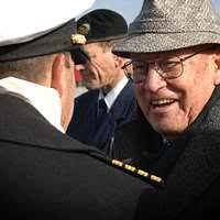 Veterans who served in the Vietnamese War stand in