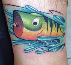 A simple design, this fishing lure tattoo using an older lure, a spoon fishing lure. Top 73 Fishing Tattoo Ideas 2021 Inspiration Guide