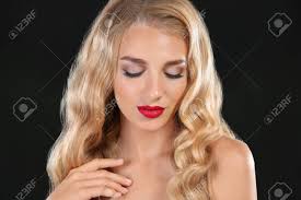 A full head of highlights starts at around $150. Beautiful Young Woman With Bright Red Lipstick On Dark Background Stock Photo Picture And Royalty Free Image Image 116623614