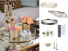 It's made from metal and has a gray whitewash finish that makes it look like wood — yet it boasts the durability of steel. Coffee Table Decor Decorist