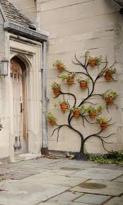 In each section, customers will find a variety of privacy and wall trellis designs in addition to garden screens that can conceal outdoor sitting areas or cover up an undesirable exterior wall. Trellis Stands With Pot Holders For Space Saving Balcony Decoration Eco Friendly Garden Ideas