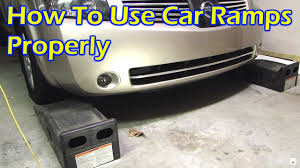 Yup i have those rhino ramps and i can change the oil with no problems. How To Use Car Ramps Properly Youtube