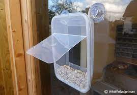 Bird feeders are a great way to attract a variety of different feathered visitors to your yard, and while you could hang the feeder near a window so you can watch birds eat from it. Make A Takeaway Tub Window Feeder Homemade Bird Feeders Window Bird Feeder Bird Feeders