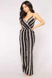 Black And White Striped Jumpsuit With Sleeves Love The Rush Stripe Jumpsuit Black White Striped Jumpsuit White Jumpsuit Outfit Black And White Romper