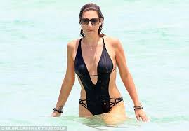 Her body looks almost exactly the. Daisy Fuentes Goes For A Dip And Flaunts Her Astonishing Figure In A Sexy Monokini Daily Mail Online
