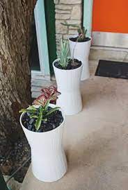 To make the template hold up. Planters They Look Like Small Trash Cans From The Dollar Tree Put End To End And Painted Diy Planters Ikea Planter Ikea Planters