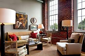 They have a sense of permanence, like they've been there for a long time even in a. Classic Red Brick Wall Creates A Lovely Ambiance In The Eclectic Living Room Desig Brick Wall Living Room Brick Living Room Modern Farmhouse Living Room Decor