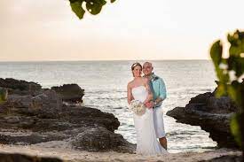 Our Wedding Packages In Grand Cayman Simply Weddings Cayman Islands Sunset Wedding Cayman Island Wedding Simple Beach Wedding