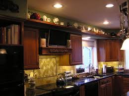 By comparison, cabinet soffits hover in the stratosphere. Sherri Kitchen Soffit Above Kitchen Cabinets Decorating Above Kitchen Cabinets