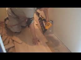 This style of flooring nail gun uses an interchangeable fuel cartridge that injects a small amount of fuel into a chamber on top of the nail driver. Installing Unfinished Hardwood Flooring Nail Down Close To A Wall Youtube