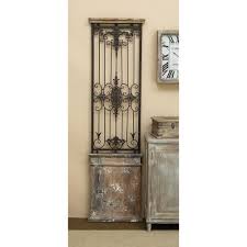 Decorative wrought iron carved metal wall art panel scroll plaque decor mirror. Litton Lane Adrian 57 In H Gate Wall Art 52726 The Home Depot Gate Wall Decor Iron Wall Wall Paneling