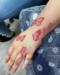 Mokoe Lockhaven On Instagram Butterflytattoo Hussle In 2021 Pretty Hand Tattoos Cute Hand Tattoos Red Ink Tattoos