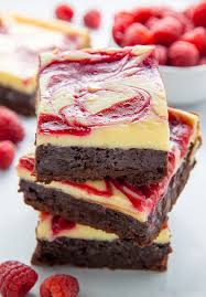 My favourite toppings are raspberries with toasted ground walnuts and almonds or blueberries and shredded dark chocolate. White Chocolate Raspberry Cheesecake Brownies Baker By Nature