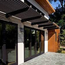 This design is an additional sheet roof on metal supports, at a height of half a meter above the main roof of the house. Modern Garage Canopy Design Novocom Top