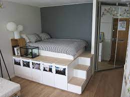 There is a huge storage area under the mattress which is accessed through one of the cabinets that has no back. Storage Platform Bed Oh Yes