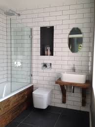 See more ideas about bathroom flooring, bathroom, grey grout. White Brick Tiles With Dark Grey Grout Scaffold Plank Bath Panel And Sink Unit Brick Bathroom Bathroom Sink Design White Bathroom Tiles