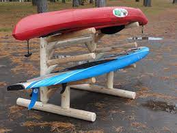 By purchasing a product, via a link on this page, we may receive a commission, at no extra cost to you. Outdoor Kayak Storage Rack Storing Kayaks Outdoors Log Kayak Rack