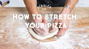 How To Stretch Pizza Dough Youtube