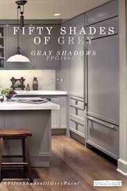 This Modern Sleek Gray Kitchen Color Scheme Features Gray Shadows Paint Color Grey Painted Kitchen Kitchen Cabinets Color Combination Kitchen Colour Schemes