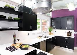 Purple Walls Black Cabinets White Counters And A Glass Vent Hood This Is One Cool Kitchen Modern Retro Kitchen White Kitchen Interior Black Kitchen Decor