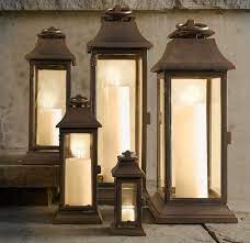 Patio decor outdoor candle lanterns homebase vintage moroccan garden lantern solar large floor powerheat led electric la hacienda tall house steel. How To Outfit Your Patio Like A Posh Hotel Lanterns Decor Patio Decor Outdoor Candle Lanterns