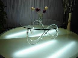 The square has long time been considered a perfect shape. Acrylic Coffee Tables New Concept For The Perfect Living Room In Uae