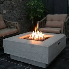 Find Serenity In Front Of The Modern And Unique Manhattan Concrete Fire Table Starfiredirect Outdoor Fire Pit Table Outdoor Fire Table Propane Fire Pit Table