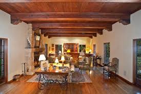 Living room in soft ivory with ceiling beams. Wooden Ceiling Beams The Living Room Has A Wood Ceiling With Exposed Beams Craftsman Living Rooms Living Room Designs