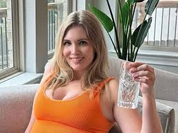 Mormon mum banned from church over explicit snaps flashes undies in racy  dress - Daily Star