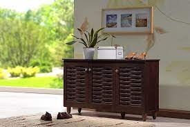 It allows for great storage, where you can easily tuck away shoes, clothes, and accessories behind the cabinet doors. Amazon Com Baxton Studio Wholesale Interiors Winda Modern And Contemporary 3 Door Dark Brown Wooden Entryway Shoes Storage Cabinet Furniture Decor