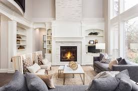 The modern fireplace in this neutral living room by elms interior design blends into its surroundings due in large part to the fact that there's no mantel. L Shaped Sofas What Are The Design Ideas Legendary Beast