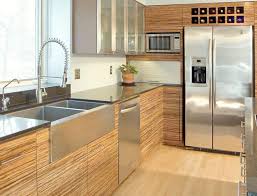 The glass cabinets in this kitchen have clear seedy glass with wood mullions and the interior lighting displays the homeowner's dishware and accent pieces. China European Kitchen Cabinets Wood Shaker Hot Sale Kitchen Cabinet Set Shaker In Stock Kitchen Cabinet Cherry Wood China Kitchen Cabinets Wood Shaker Kitchen Cabinet Set Shaker