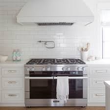 Use hammer and flat bar to pry existing tiles—one at a time—from backsplash wall. Keep These 5 Things In Mind When Choosing Your Backsplash