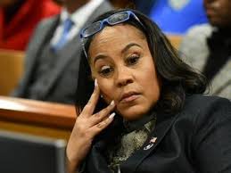 Documents say Fulton County DA Fani Willis was booked
