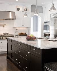 Rather, an idea in kitchen cabinetry to paint the base cabinets black (or a dark color) and the uppers white (or light). Black And White Kitchen Designs Photo Gallery