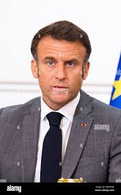 French President Macron speaks as he chairs a meeting with representatives  of Human rights group Reporters Without Borders (RSF) and members of a  commission, to draft an "International Declaration