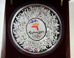 The international olympic committee (ioc) was attracted to the city's long history of enthusiasm for sports, its promise to use recovered toxic wastelands as sites for sporting venues, and its plan to involve the smaller countries of oceania in hosting activities. Rare Sydney Olympic 2000 Kilo Silver Coin