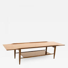 The rocket coffee table is a modern take mid century styling, inspired by iconic 1960's silhouettes. Grete Jalk Grete Jalk Style Mid Century Walnut Coffee Table