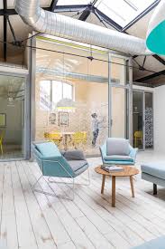In this movie filmed by dezeen she talks about designing offices for brands including sony music. Deskopolitan Moreysmith Archdaily