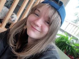 What are some tips for training a dog to wear sunglasses?