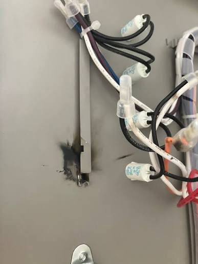 Electricians find and fix hidden live wire issue causing breaker trips