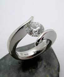 Made In Canada One Carat Diamond Tension Set In My 10 Iridium Etsy In 2021 One Carat Diamond Bridal Diamond Ring Best Engagement Rings