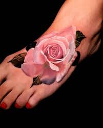 This one is a much larger tattoo and features multiple roses in black ink. 25 Amazing Foot Tattoo Designs With Meanings Saved Tattoo