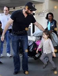 The couple have two kids: Photos And Pictures A Bearded Hugh Jackman Arrives At Lax On A Flight From New York With His Family Wife Deborra Lee Furness And Their Kids Son Oscar 10 And Daughter Ava